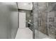 Modern bathroom with a glass enclosed shower and a vanity with a vessel sink at 165 Inveraray Ct, Henderson, NV 89074