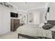 Bedroom with a comfy bed, dark wood dresser, and ambient lighting at 165 Inveraray Ct, Henderson, NV 89074