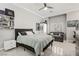 Bright bedroom featuring a large bed, sofa, and ample natural light at 165 Inveraray Ct, Henderson, NV 89074