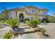 Charming front entrance with landscaped steps leading to a beautiful and inviting home at 165 Inveraray Ct, Henderson, NV 89074