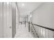 Bright hallway with white marble floors, staircase, and access to multiple rooms at 165 Inveraray Ct, Henderson, NV 89074