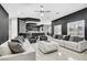 Open concept living space with stylish furnishings, modern lighting, and sleek design at 165 Inveraray Ct, Henderson, NV 89074