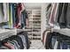 Well-organized walk-in closet with custom shelving and ample storage for clothes and shoes at 165 Inveraray Ct, Henderson, NV 89074