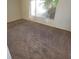 Bedroom featuring wall-to-wall carpeting and a large window with natural light at 1673 Caliente Ct, Las Vegas, NV 89119