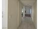 Hallway with tile flooring leading to other rooms in the house at 1673 Caliente Ct, Las Vegas, NV 89119