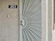 Close up of the front door and apartment number at 2011 Sue Ct # 203, Las Vegas, NV 89108
