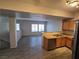 Kitchen features modern flooring, stainless appliances, and lots of natural light at 2011 Sue Ct # 203, Las Vegas, NV 89108