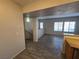 Bright living room features modern flooring, and access to the second story at 2011 Sue Ct # 203, Las Vegas, NV 89108