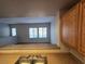 An open-concept room with views of the living area from the kitchen with plenty of light at 2011 Sue Ct # 203, Las Vegas, NV 89108