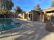 A view of the community pool, lounge area and changing facilities at Rancho Lake Condominiums at 2011 Sue Ct # 203, Las Vegas, NV 89108