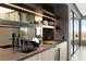 A sleek bar area has stylish shelving and a beautiful view at 21 Rockstream Dr, Henderson, NV 89012