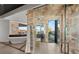 A luxurious bathroom has a glass-enclosed shower and a freestanding soaking tub with a view at 21 Rockstream Dr, Henderson, NV 89012