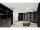 A spacious walk-in closet offers ample storage with custom shelving and drawers at 21 Rockstream Dr, Henderson, NV 89012