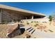 Modern home with desert landscaping and stone accents leading to front entrance at 21 Rockstream Dr, Henderson, NV 89012