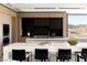 Modern kitchen with stainless steel appliances, sleek cabinetry, and a large island at 21 Rockstream Dr, Henderson, NV 89012