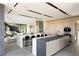 Spacious modern kitchen with a large island, sleek cabinets, and stainless steel appliances at 21 Rockstream Dr, Henderson, NV 89012