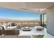 Relaxing outdoor patio with a fire pit and panoramic views of the city at 21 Rockstream Dr, Henderson, NV 89012