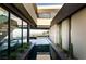 Modern home featuring sleek pool design with desert landscaping and stunning city views at 21 Rockstream Dr, Henderson, NV 89012