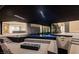 Luxurious outdoor pool area with a built-in fire feature and inviting lounge spaces at 21 Rockstream Dr, Henderson, NV 89012