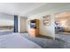 Comfortable bedroom featuring two beds, a TV, and a view of the city at 211 E Flamingo Rd # 1011, Las Vegas, NV 89169