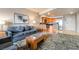 Inviting living room featuring a comfortable couch, a modern kitchen, and stylish decor in The Platinum Hotel and Spa at 211 E Flamingo Rd # 1011, Las Vegas, NV 89169