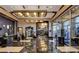 The Platinum Hotel and Spa lobby with elegant marble floors, modern lighting, and a stylish reception area at 211 E Flamingo Rd # 1011, Las Vegas, NV 89169