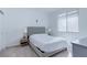 Sunlit bedroom featuring a comfortable bed and large window, providing natural light at 2114 Cold Canyon Ave, North Las Vegas, NV 89086
