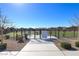 Gated dog park with seating areas and ample space for pets to play, set in a well-maintained community at 2114 Cold Canyon Ave, North Las Vegas, NV 89086