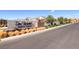 Community entrance sign 'Del Webb North Ranch' with desert landscaping, creating a welcoming arrival at 2114 Cold Canyon Ave, North Las Vegas, NV 89086