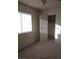 Bedroom featuring neutral walls, carpet and a closet at 212 Bradshaw Way, Las Vegas, NV 89145