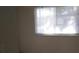 Bedroom with a window and neutral walls at 212 Bradshaw Way, Las Vegas, NV 89145
