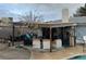 Spacious covered patio with seating area and view of pool and backyard at 212 Bradshaw Way, Las Vegas, NV 89145