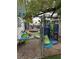Exterior shot of backyard play area with playground and trampoline at 212 Bradshaw Way, Las Vegas, NV 89145