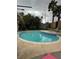 Backyard pool with tile accents, ladder, and a deck at 212 Bradshaw Way, Las Vegas, NV 89145