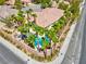 Aerial view of a home with a beautiful pool surrounded by palm trees, creating a private and tranquil backyard escape at 2290 Casa Bella Ct, Las Vegas, NV 89117