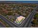 Overhead aerial of property showcasing prime location surrounded by lush greenery, and nearby amenities at 2290 Casa Bella Ct, Las Vegas, NV 89117