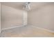 Bedroom with a ceiling fan and neutral walls and carpet at 2290 Casa Bella Ct, Las Vegas, NV 89117