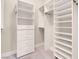 Custom walk-in closet with adjustable shelving, drawers, and ample storage space at 2290 Casa Bella Ct, Las Vegas, NV 89117