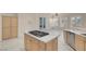 Spacious kitchen with a large island, stainless steel appliances, and custom cabinets at 2290 Casa Bella Ct, Las Vegas, NV 89117