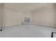 Spacious living area with tile floors and cozy fireplace, providing comfort and style at 2290 Casa Bella Ct, Las Vegas, NV 89117
