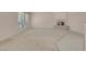 Expansive living room with neutral carpet and a corner fireplace at 2290 Casa Bella Ct, Las Vegas, NV 89117