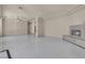 Expansive living area with open floor plan, gleaming floors, and fireplace provides inviting space at 2290 Casa Bella Ct, Las Vegas, NV 89117