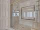 Tiled shower with glass enclosure, offering a luxurious bathing experience at 2290 Casa Bella Ct, Las Vegas, NV 89117