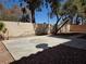 Backyard area featuring a large concrete patio and desert landscaping at 2606 Heartland Ave, Henderson, NV 89074
