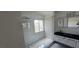 Modern bathroom featuring glass enclosed shower and white marbled vanity at 2606 Heartland Ave, Henderson, NV 89074