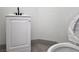 Bathroom featuring a new vanity with a modern faucet and a wrapped toilet at 2606 Heartland Ave, Henderson, NV 89074