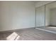 Bedroom with wood-look flooring and a mirrored closet at 2606 Heartland Ave, Henderson, NV 89074