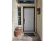 Close-up of the front door, showcasing its design and the surrounding exterior details at 2606 Heartland Ave, Henderson, NV 89074