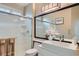 Well-lit bathroom featuring a large shower and a sink with sleek fixtures at 2743 Evergreen Oaks Dr, Henderson, NV 89052