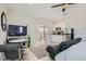 Comfortable main bedroom with mini kitchen, exterior access and lounge area at 2743 Evergreen Oaks Dr, Henderson, NV 89052